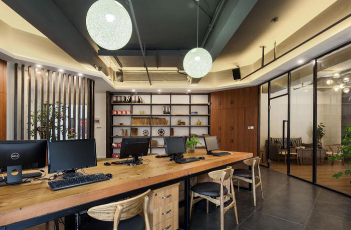 進出口貿(mào)易公司辦公室展示架裝修設計效果圖