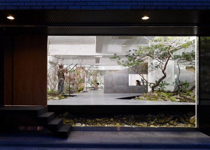 皮具公司辦公室入口裝修設計效果圖